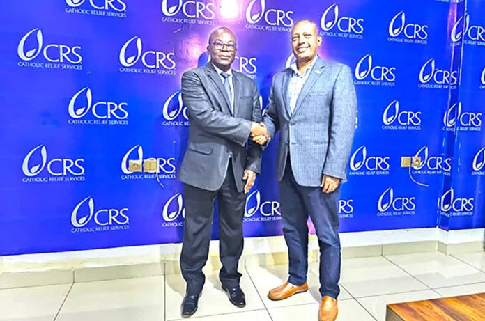 De gauche à droite Mr Gon Myers Représentant et Directeur Pays du PAM et le Dr Alemayehu Gebremariam Représentant Résident du CRS Congo.